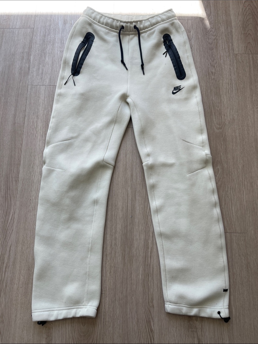 Nike Mens Cream Jogger Pants with Black Zipper Accents